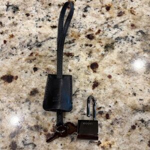 Gucci Black Leather lock for bag, purse, back pack or duffle bag.